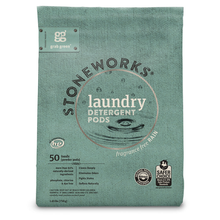 A green package of grab greens Stoneworks Laundry Detergent Pods - Rain, labeled for 50 loads, is fragrance-free and eliminates odors while fighting stains. The bag features textured lines and displays the EPA Safer Choice Certified and cruelty-free logos.