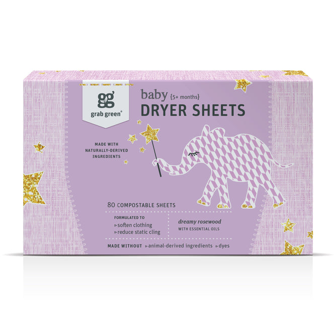A box of grab green Baby Dryer Sheets (5+ Months) - Rosewood shows a pink and white elephant with a gold star wand on a light purple, starry background. These natural baby dryer sheets provide static reduction and a Dreamy Rosewood scent.