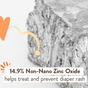 A close-up of a zinc mineral chunk with text overlay: 14.9% Non-Nano Zinc Oxide in Babo Botanicals Sensitive Baby Diaper Rash Cream Spray helps treat and prevent diaper rash for sensitive baby skin. An orange graphic arrow points from the left toward the zinc, highlighting our fragrance-free formula.
