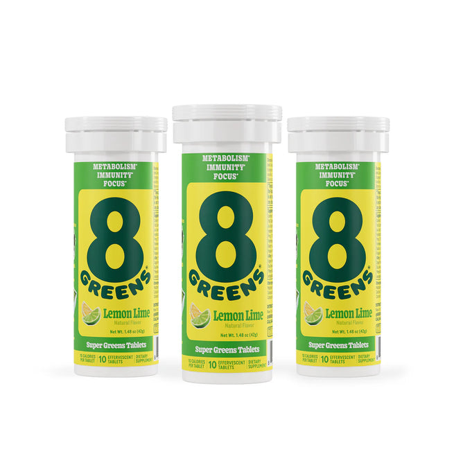 Three 8Greens Super Greens Tablet - Lemon Lime bottles are side by side, featuring green and yellow packaging with 8 GREENS text. Labeled for immunity support, metabolism, and focus, these tablets offer a boost in every serving. Each cylindrical bottle contains 10 tablets.