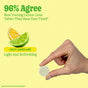A hand holds a Super Greens Tablet - Lemon Lime by 8Greens against a yellow background. Text reads: 96% Agree Best Tasting Lemon Lime Tablet They Have Ever Tried*. Nearby, sliced lemon and lime flaunt Juicy Lemon Lime, Light and Refreshing. Supports metabolism. Based on 4000-participant study.