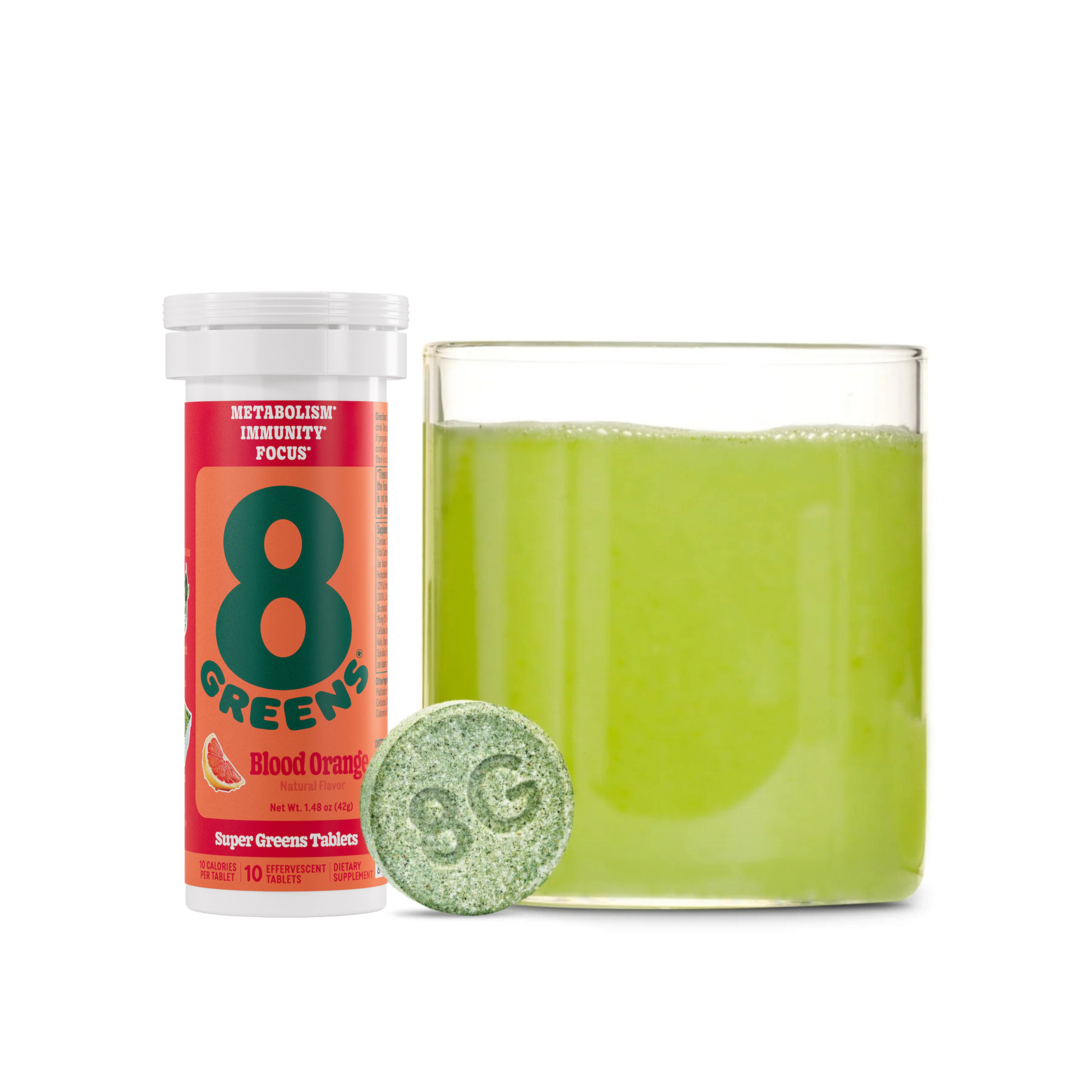 A tube of 8Greens Super Greens Tablet - Blood Orange stands beside a glass of green liquid. A visible tablet marked with 8G promises to boost immunity and support metabolism.