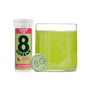 A tube of 8Greens Super Greens Tablet - Cucumber Watermelon stands beside a glass of green drink, with a green tablet labeled 8G in front—perfect for supporting immunity.