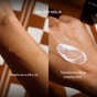 Two hands display Ember Wellness’ Hydrating Body Cleanser: the left hand holds the silky, clear oil, while the right reveals its transformation into a creamy white milk. Text reads: Begins as a silky oil. Transforms into a creamy milk. This gentle oil-to-milk cleanser from Ember Wellness supports skin hydration and cares for your skin microbiome.