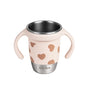 The BEABA Stainless Steel Learning Cup, Click & Drink, is a pink and stainless steel toddler cup with two handles and a heart pattern for easy gripping. Designed with a 360° valve-free, spill-proof feature, it’s perfect for little ones transitioning to independent drinking.