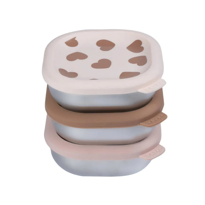 Here is the rewritten sentence using your product data: The BEABA Stainless Steel Bowls with Lid Set includes three stackable, microwave-safe baby containers featuring pastel silicone lids: the top lid is beige with a brown heart pattern, the middle is solid brown, and the bottom is solid pink. Each portable snack box has tabs labeled VIV.