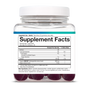 A clear plastic jar with a white lid contains Youtheory Ashwagandha Zero Sugar Gummies. The label shows Supplement Facts and highlights a blend of KSM-66 ashwagandha and ginger extract for stress relief.