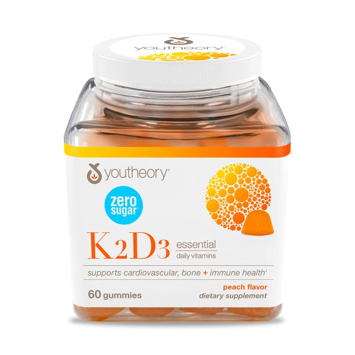 Youtheory Vitamin K2D3 Zero Sugar Gummy comes in a clear plastic container with 60 peach-flavored gummies, supporting cardiovascular, bone, and immune health. The label highlights zero sugar.