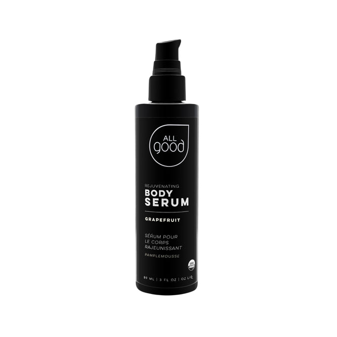 A sleek black 3 fl oz (90 ml) bottle of All Good body serum, featuring a refreshing grapefruit scent and Sea Buckthorn Oil for skin vitality. It includes an English and French-labeled pump dispenser.