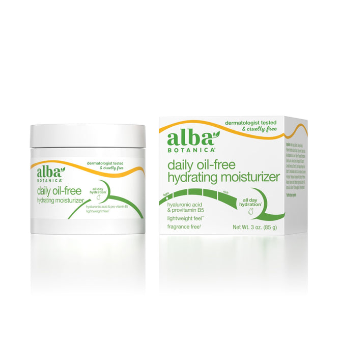 The Alba Botanica Daily Oil-Free Hydrating Moisturizer is shown in a jar and box with white, green, and yellow packaging, emphasizing hyaluronic acid and oil-free hydration for lightweight, daily moisturizing.