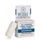 A white solid soap refill tablet leans against a Meliora All-Purpose Home Cleaner Refill Tablets box, which highlights being plastic-free, fragrance-free, and dye-free.