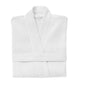 The Coyuchi Unisex Organic Waffle Robe, featuring a classic waffle weave and crafted from organic cotton, is displayed neatly folded with its collar and belt against a plain white background.