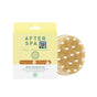 A packaging box labeled Afterspa contains a partially visible Massage & Detox Brush with light bristles and white tips for exfoliation. The box has green text, a QR code, and is perfect for fans of shower spa products.