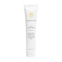 A white tube of Innersense Organic Beauty Air Dry Styling Cream stands upright, adorned with gold and black text, a yellow sunburst logo, and product information in both English and French. This lightweight smoothing cream from Innersense Organic Beauty provides frizz control for effortless, heat-free styling.