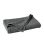 A neatly folded Coyuchi Air Weight® Organic Towel in dark gray rests on a plain white surface, highlighting its textured organic fabric, absorbent quality, and soft appearance.