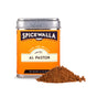 A tin from the Spicewalla Taco 3 Pack Collection sits beside a heap of reddish-brown seasoning, perfect for bringing authentic Mexican street taco flavours to your next Taco Tuesday.