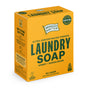 A yellow box of Ingredients Matter Laundry Soap Powder 60 Load in Amber + Sandalwood is labeled as a plastic-free detergent and highlights safe, simple, handpicked ingredients.