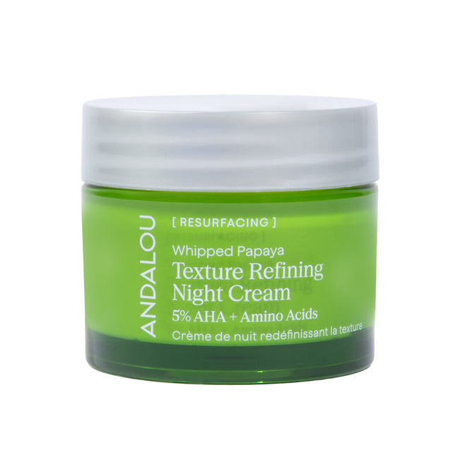 Green jar of Andalou Naturals Resurfacing Texture Refining Night Cream with 5% AHA and amino acids—a nourishing anti-aging moisturizer. White lid on top; product name and details printed in white on the front.