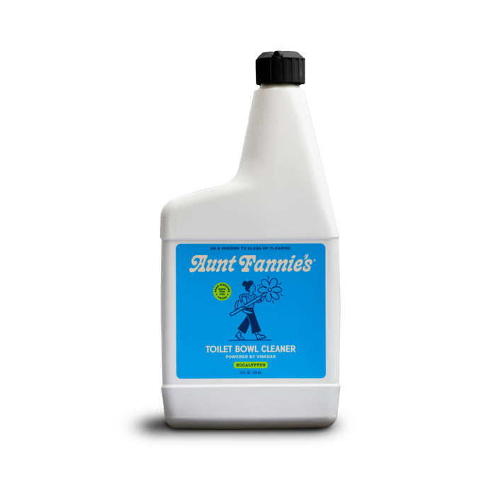 Aunt Fannies Toilet Bowl Cleaner - Eucalyptus comes in a white plastic bottle with a black cap and blue label featuring a cartoon figure holding a flower. Its bleach-free, vinegar-powered formula is non-toxic and safe for regular use.
