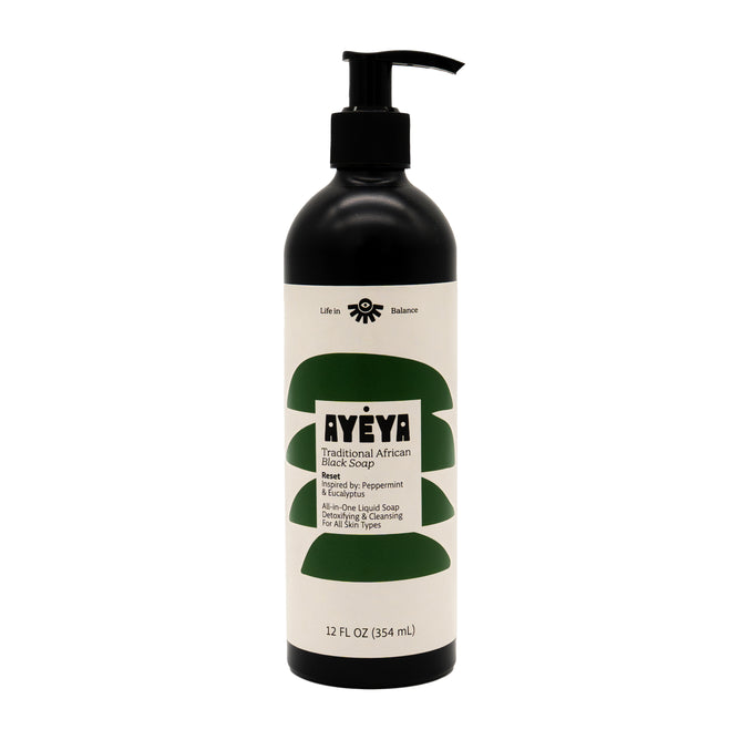 A black pump bottle labeled “Ayeya TABS Liquid” for face and body, 12 fl oz, with a minimalist white label featuring green abstract shapes—formulated to detoxify and promote skin balance.