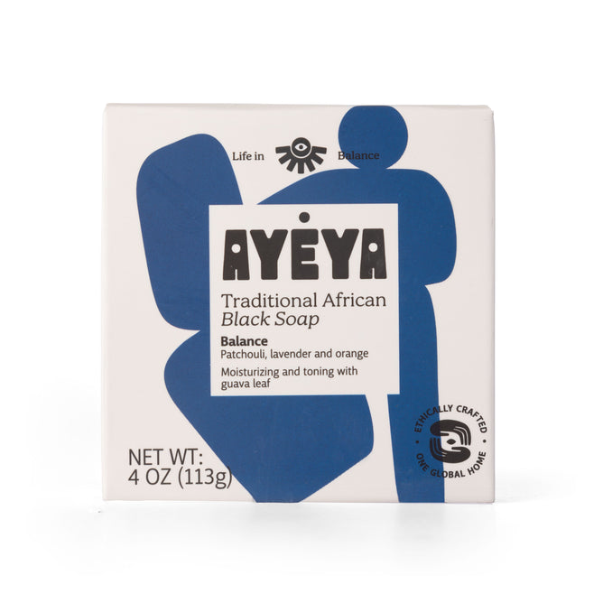 A white box of Ayeya TABS Bar African Black Soap with blue abstract shapes, labeled Balance and scented with patchouli, lavender, and orange. The 4 oz (113g) box highlights antioxidant oils, natural exfoliants, and an ethical crafting seal.