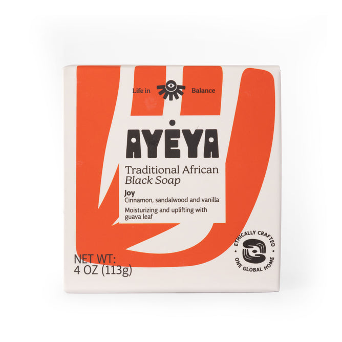 A 4 oz (113g) TABS Bar by Ayeya, with orange and white packaging. Joy scent blends cinnamon, sandalwood, vanilla, and guava leaf. Ethically crafted with natural exfoliants.