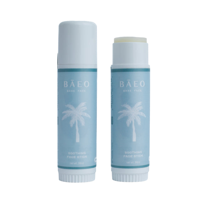 Two blue Baeo Bare Face - Soothing Face Stick tubes—one open, one capped—featuring a white palm tree. Ideal for moisturizing and soothing sensitive skin.
