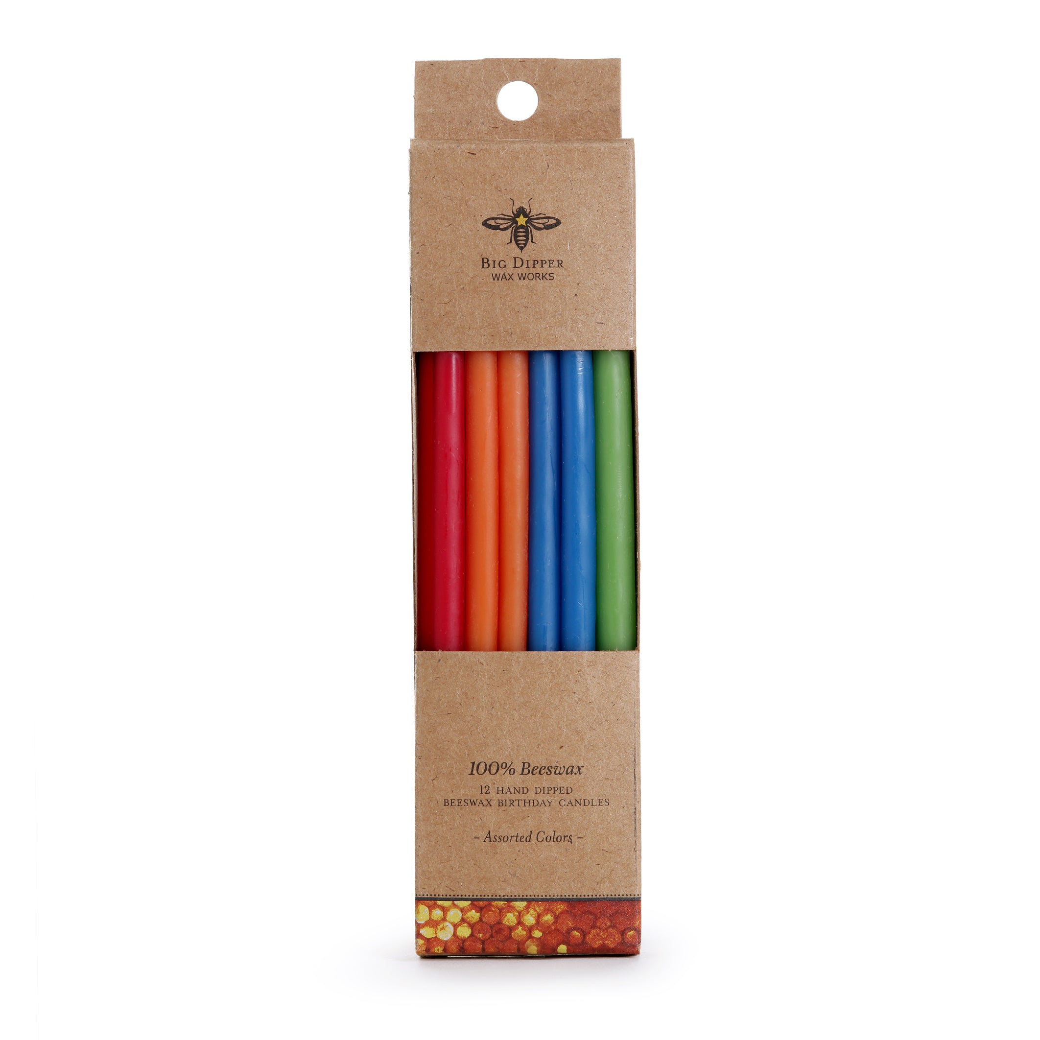 A 12-pack of Tall Birthday Tapers by Big Dipper Wax Works comes in an eco-friendly box with a bee graphic, labeled “100% Beeswax.” The assorted hand-dipped candles are visible through the window.