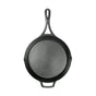 The Lodge Blacklock Blacklock Triple Seasoned Skillet is shown from above on a white background, featuring a black finish, a long handle, and a smaller helper handle opposite.