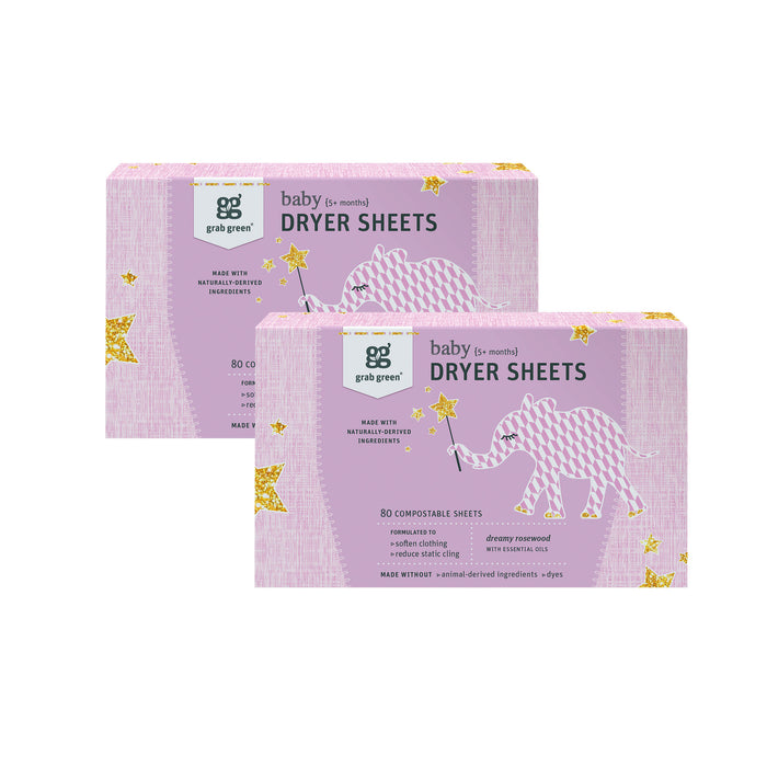 Two pink boxes of grab green Baby Dryer Sheets (5+ Months) - Rosewood, each with 80 compostable sheets and a white and pink elephant holding a yellow star wand, for gentle static reduction.