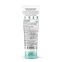 Back view of a white tube with green cap of Badger Balm Daily Mineral Sunscreen - SPF 50, labeled for healthy skin. The packaging displays drug facts, directions, warnings, and icons indicating cruelty-free, vegan, clean ingredients, and reef-safe. This mineral sunscreen offers broad-spectrum SPF 50 protection and doubles as a sensitive skin moisturizer.