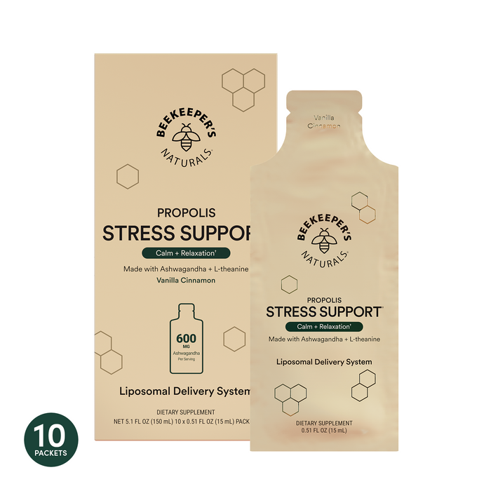 Box and single packet of Beekeeper’s Naturals Stress Support Liposomal supplement, Vanilla Cinnamon flavor, labeled Calm + Relaxation, made with KSM-66 Ashwagandha and L-theanine; includes 10 packets.