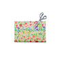 A pair of scissors rests on colorful, illustrated fabric, highlighting Bee's Wrap Beeswax Wraps for Food - Cut to Size Roll as an eco-friendly plastic wrap alternative for sandwiches against a white background.