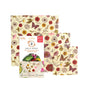 Bee's Wrap Reusable Beeswax Food Wraps – Assorted 3 Pack features floral and butterfly designs, shown beside packaging that emphasizes eco-friendly, plastic-free, and compostable benefits for sustainable food storage.