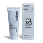 A tube and box of before Whitening Toothpaste Fluoride-Free feature minimalist white packaging with black text. Plant-based, SLS-, parabens-, and PEGs-free, the toothpaste highlights clean ingredients for a safer smile.
