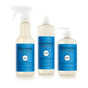 The Mrs. Meyer’s Summer Cleaning Set – Home Essentials features three products in clear bottles with blue and white labels, arranged side by side on a white background.