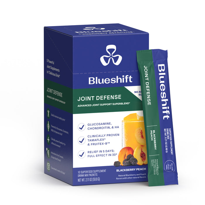 A box and single packet of Blueshift Nutrition Joint Defense drink mix in blackberry peach flavor with glucosamine chondroitin for joint support. Packaging highlights ingredients, benefits, and images of blackberries, peaches, and orange drink.
