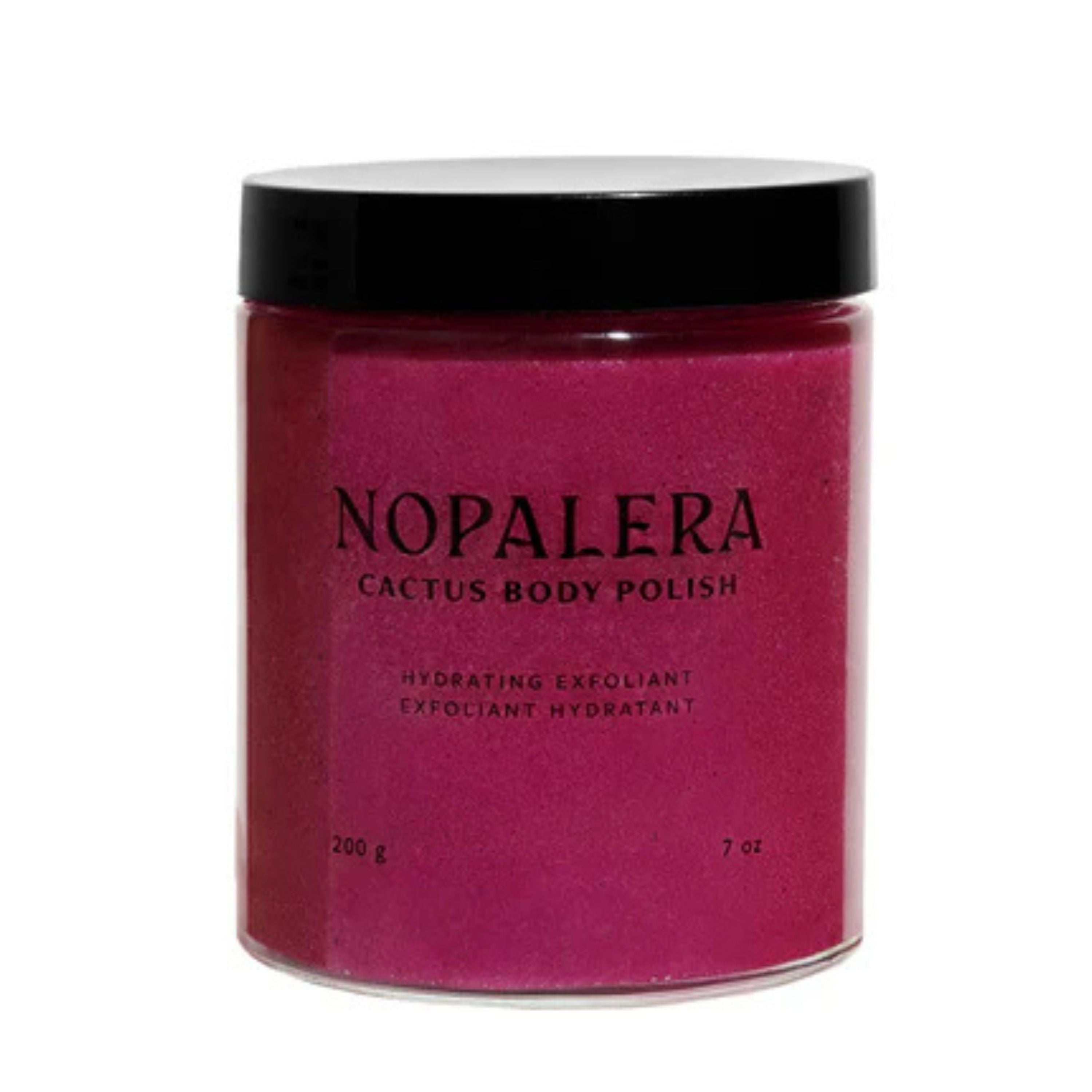A jar of Nopalera Cactus Body Polish with a bright pink scrub inside, featuring a black lid and minimalist black text on the label.
