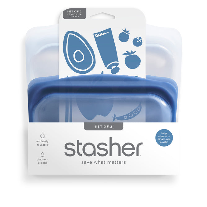 Set of 2 blue Stasher Reusable Silicone Sandwich Bags in packaging with blue food illustrations, highlighting they’re endlessly reusable, dishwasher safe, and made of platinum silicone.
