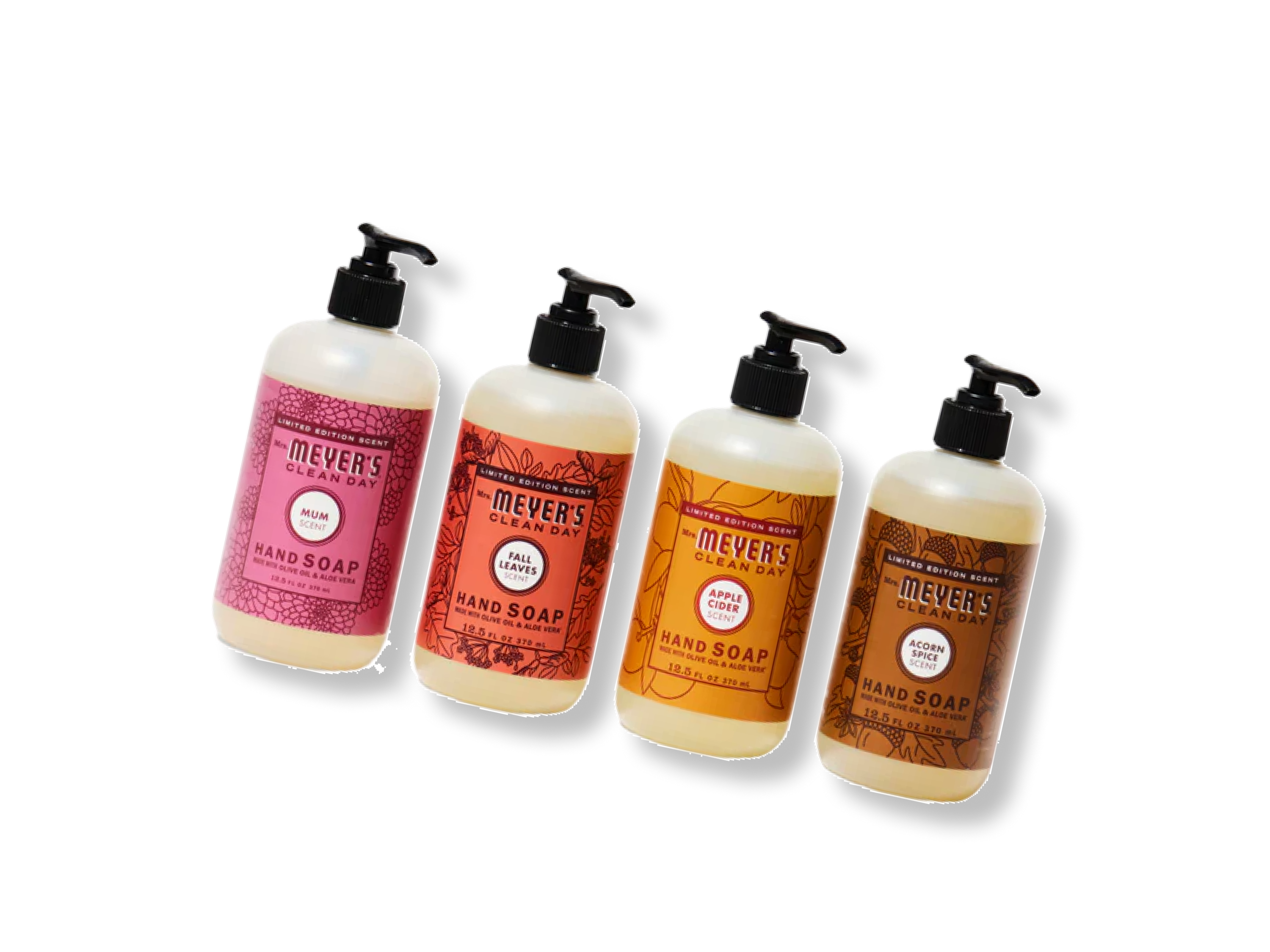 Four pump bottles of Mrs. Meyer’s Clean Day hand soap in different scents—peony, parsley, geranium, and acorn spice—arranged in a row on a white background.