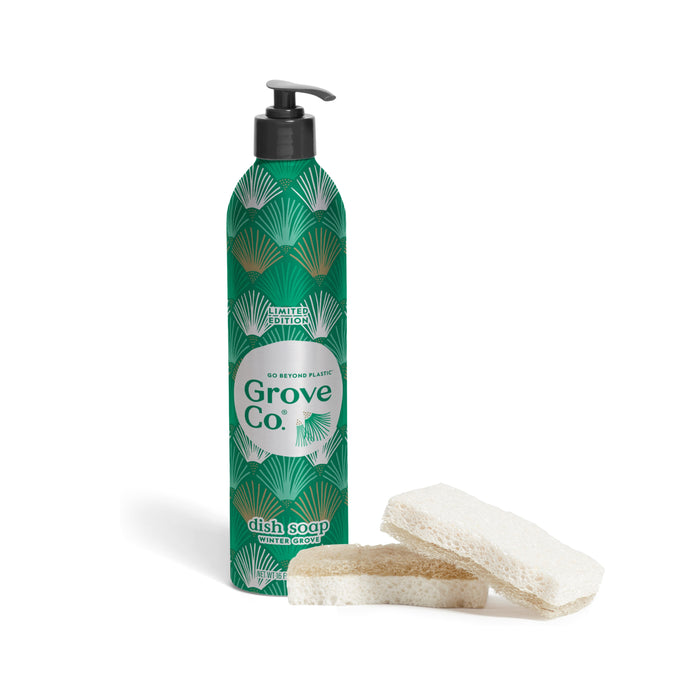 A Grove Co. The Ultimate Holiday Dish Duo, featuring a pump bottle of plant-based dish soap with a green fan pattern and two coconut scouring pads.