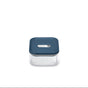 The Caraway Glass Small Container, 1 qt, features non-toxic glass with a dark blue button-seal lid. Its transparent square design is set against a plain white background.