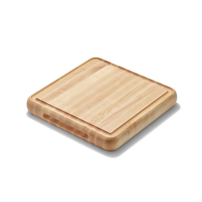 The Caraway Edge-Grain Wood Prep & Serve Butcher Block, 12", features square edges, rounded corners, and a perimeter groove. Shown on a white background.