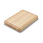 The Caraway Edge-Grain Wood Prep & Serve Butcher Block, 17”, features rounded edges and a shallow perimeter groove—ideal for charcuterie—displayed on a white background.