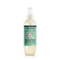 A bottle of Mrs. Meyers Clean Day Cat Deodorizing Spritz in Sweet Orange scent, featuring a spray nozzle and a green label with product details, standing upright on a white background.