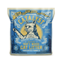 A blue and yellow bag of Catalyst Pet Upcycled Natural Pine Clumping Cat Litter, Unscented, featuring an illustrated cat, mountains, sunburst, and text promoting natural odor control and sustainability.