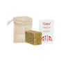 The Grove Collaborative Bar Soap + Saver Bag Duo is displayed on a white background, featuring a mesh pouch, a rectangular bar of soap, and a white box labeled Rooted Beauty Handcrafted Soap Bar, Cedar & Sage.