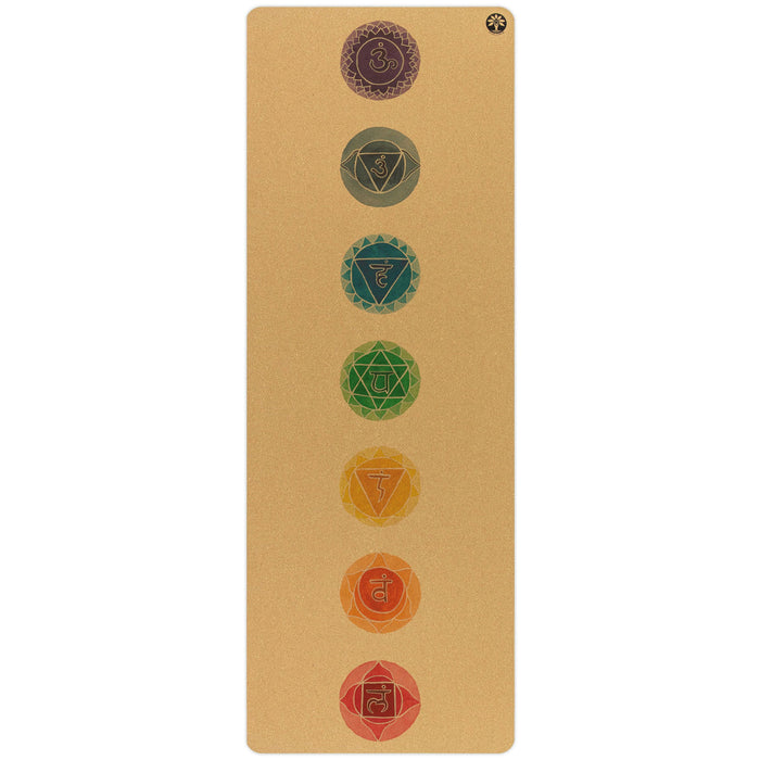 The Chakras Aura Cork Yoga Mat by Yoloha Yoga is a tan, cushioned yoga mat with a cork surface that displays seven colored chakra symbols arranged vertically down the center, each symbol representing a different energy center in the body.