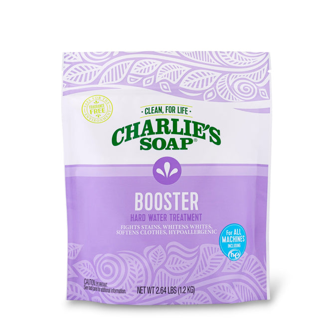 Charlie's Soap Laundry Booster & Hard Water Treatment Powder comes in a 2.64 lb (1.2 kg) bag with a purple and white leaf-patterned design, highlighting stain removal, whitening, and powerful laundry boosting benefits.