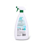 A white Charlie's Soap Indoor & Outdoor Multi-Purpose Surface Cleaner Spray bottle with a green trigger is shown from the back. The label displays instructions, warnings, teal and black icons, and leaf graphics at the top.